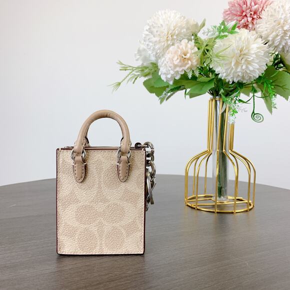 Coach CX069 North/South Mini Tote Bag Charm In Signature Canvas IN Sand Taupe - Picture 3 of 6